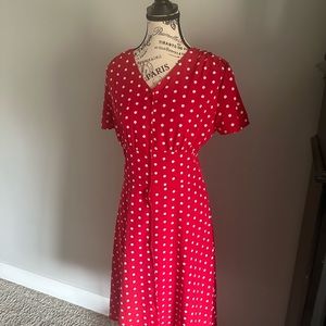 Red knee high polka dot dress.